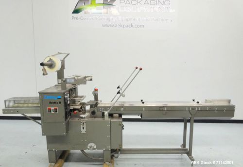 Used- doboy model scotty ii horizontal flow wrapper. utilizes non-registered, st for sale