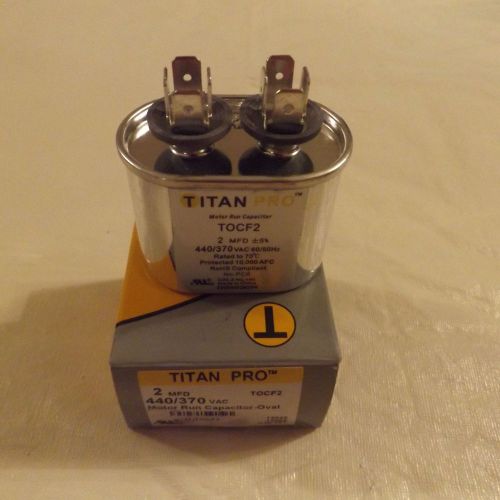 2 new titan pro tocf2 motor run capacitor oval 2 mfd 440/370vac , oval for sale