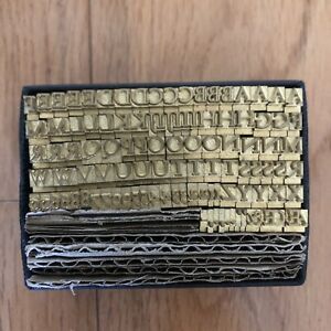 Bookbinding: Centaur 16pt Brass Type with Quads and Spacers
