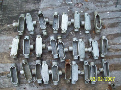 LOT OF 27 T HALF INCH COUPLERS-USED- W/-W/O COVERS