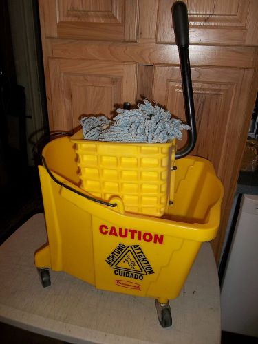 Rubbermaid mop bucket &amp; wringer # 6127 yellow  and mop head for sale