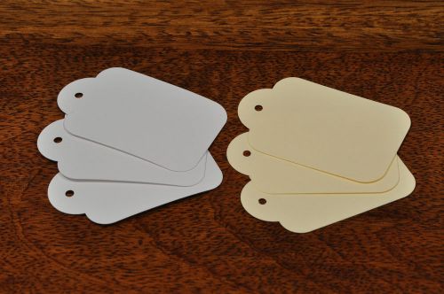 100 UNSTRUNG TICKETS 59MM X 38MM WHITE OR CREAM PRICE TAGS