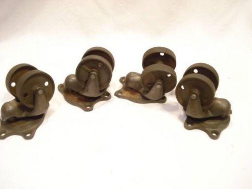 Set of 4 schneck dual wheel casters cast iron vtg industrial table cart swivel for sale