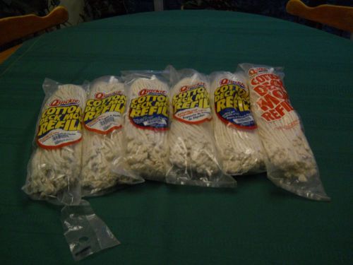 6 Quickie mop heads, Refills  New in the packs