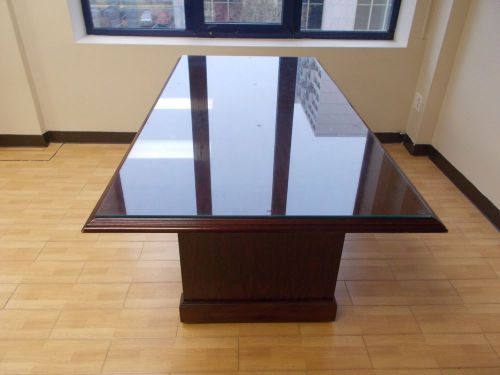 mohagany conference table w/ 6 leather chairs and table top protective glass