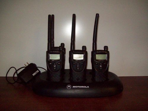 Motorola Gang Charger NNTN4028B with Power Supply and Four XV1100 Radios