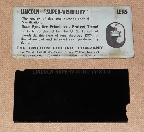Used and chipped vintage lincoln supervisibility glass welding lens no. 11 for sale