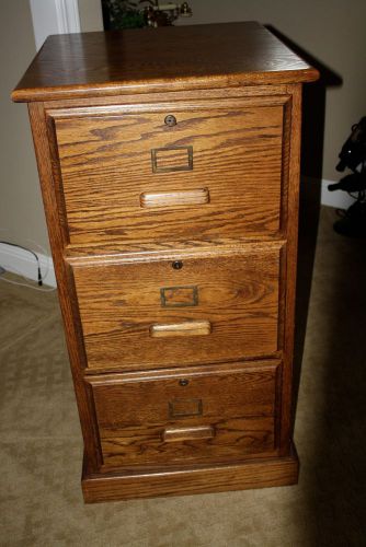 Oak 3 drawer file cabinet- legal and letter size