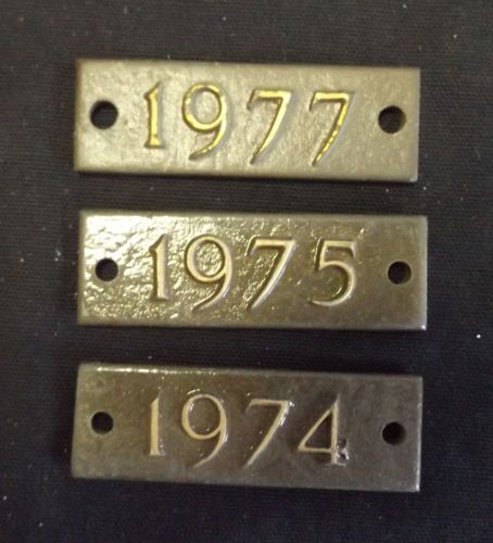 3 unused mint brass bronze year plates 1974 1975 1977 plaques never used for sale