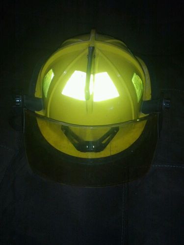 Cairns 1010 Traditional Yellow fiberglass firefighting helmet, standard config.