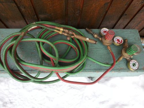 Vintage brass cutting torch with regulators and hose for sale