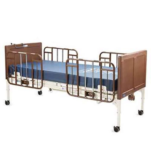 Invacare 5510 Hospital Bed with mattress and side rails.