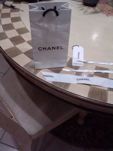 Chanel small paper shopping bag with ribbons with Chanel logo