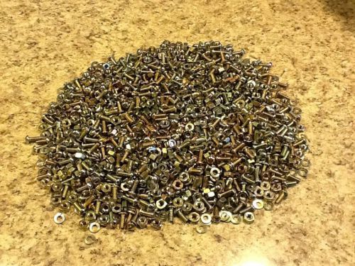 10 lb. lot of around 1,000 round slotted bolts lock washers nuts for sale