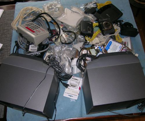 Lot of wires, cables, players, time controller, modems, speakers, computer parts
