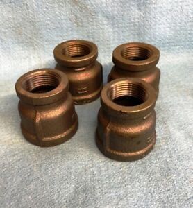 MALLEABLE BLACK IRON REDUCING COUPLING 1-1/4&#034; X 1&#034;  ** LOT OF 4 **