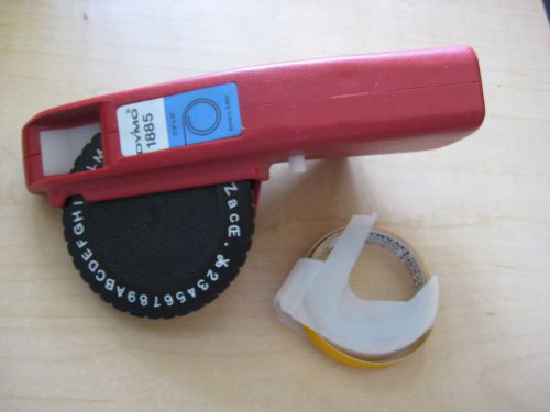 Dymo 1885 label maker with yellow tape for sale
