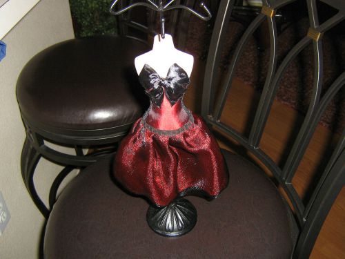 jewelry display stand w/ 6 pegs at top bust w/ burgandy dress bottom black stand