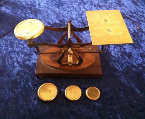 UNIQUE VINTAGE POST BRASS SCALE ON FINE OLIVE WOOD BASE  INCLUDING 3 WEIGHTS.