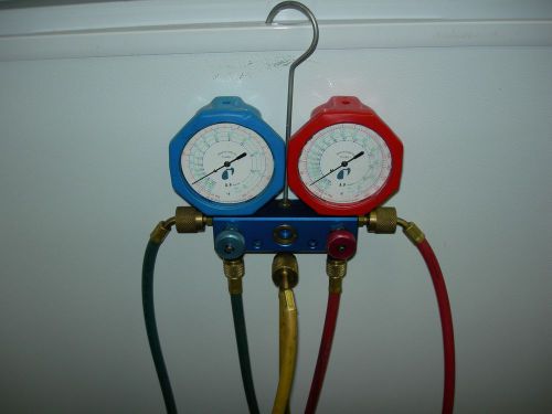 Lightly used hvac manifold gauge set r-12, r-134a, &amp; r404a yellow jacket hoses for sale