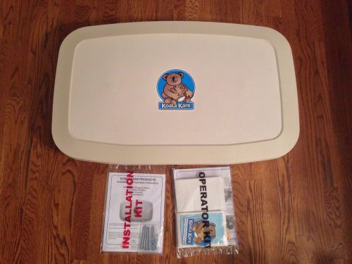 New koala karr kb200-00 baby changing station cream surface mount by bobrick for sale