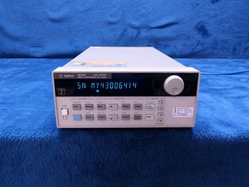 Agilent 66319d dual output power supply mobile communication dc source  *tested* for sale