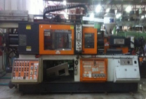 (1984) wind 200 ton 12 oz (340 gr) injection molding machine for sale