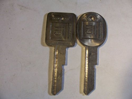 1 SET   NOS  A &amp; B  GM  KEY BLANK  WITH KNOCKOUT IN PLASE  UNCUT   ORIGINAL