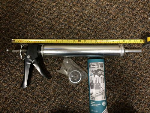 Albion bulk caulk gun with manual and extra ring. for sale