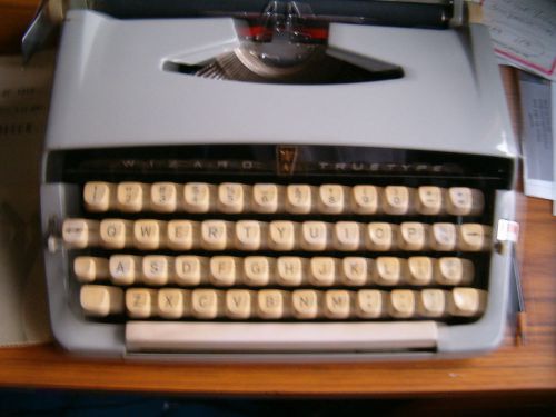 Wizard Truetype Portable Typewriter with case in new condition