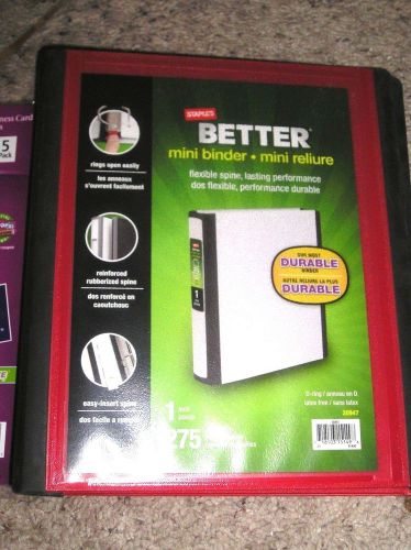 Staples brand red mini binder plus extra dividers, sheet protectors, etc for sale