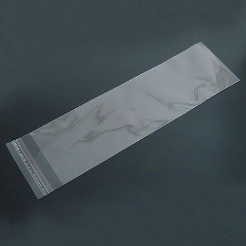 Bag, plastic, clear, 20x6mm with adhesive strip.Sold per pkg of 200. JD006