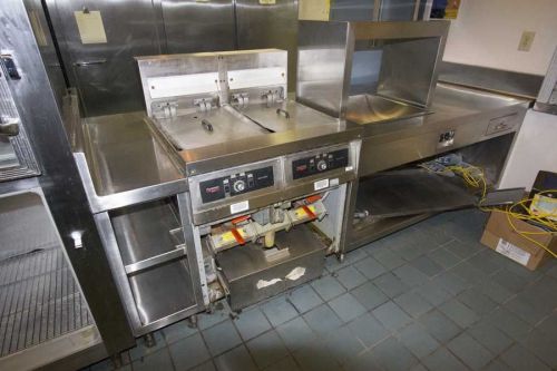 Fry master ( 4-well) line station (9 foot) w heating bin ( w lamps) clean cond. for sale