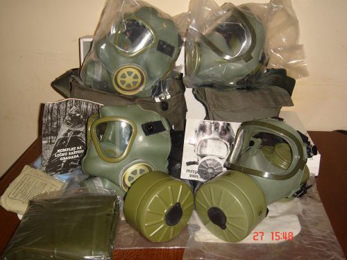 Gas masks-family kit with 2 adult and 2 children masks. sealed with filters for sale