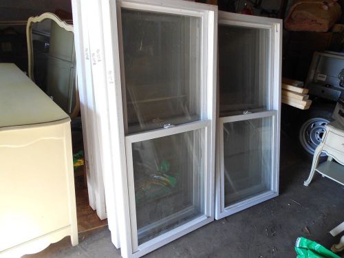 12 Windows 28-1/2 by 57-1/2 Double hang used but in good condition save money