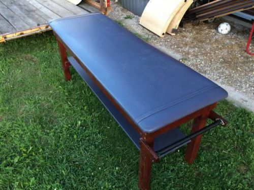 Used well cared for  treatment exam doctor medical table with lower bench for sale