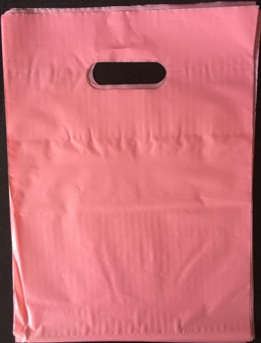 50 -12x15 pink frosty plastic merchandise bags w/handles, retail use bags for sale