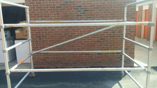 Scaffold werner base end frames wide with support bars.