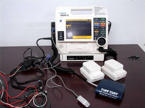 Lifepak 12 biphasic 12 lead ecg nibp spo2 etco2 aed 2 battery ac power (french) for sale