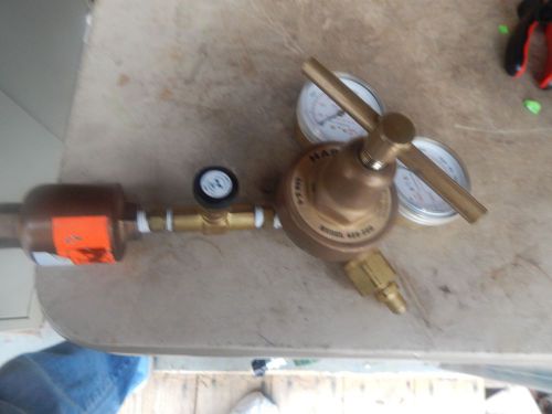&#034;harris&#034;  model # 425-200 regulator with 1/4&#034; shut off , and check valve for sale
