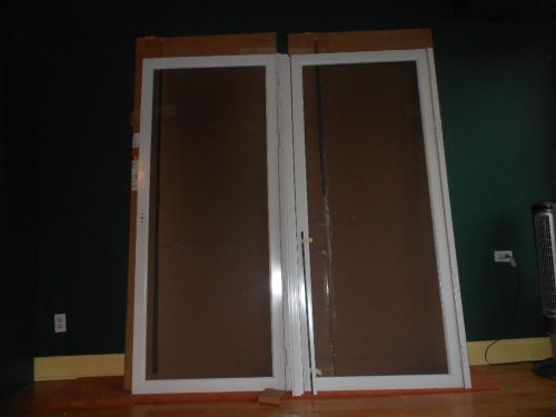 NEW in box Pair (2) Pella SPECIAL ORDER Screen doors