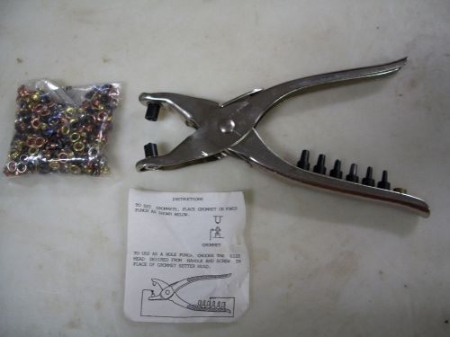 Hole punch &amp; grommet tool with a bag of gromets unused with punch sizes for sale