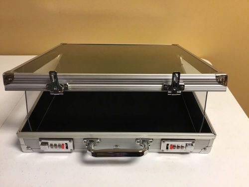 Aluminum glass top display case with side panels and combination locks for sale