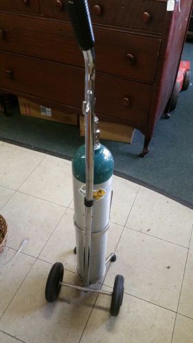 OXMAX GREEN LUXFER AIRGAS OXYGEN TANK WITH ROLLER.