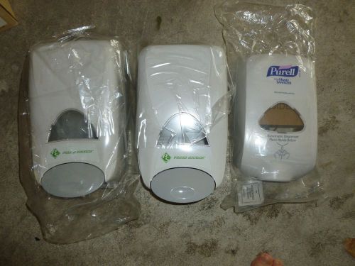 2 Prime Source Soap manual dispensers and 1 Purell automatic hand santizer disp.