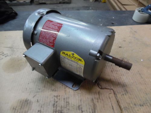 Baldor industrial motor, .33 hp, fr 56, rpm 1725, volts 208-230/460, new-surplus for sale