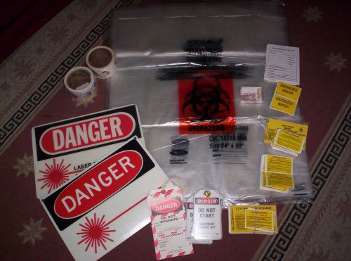 A group of new bags, labels, signs for danger/harzard waste in lab for sale
