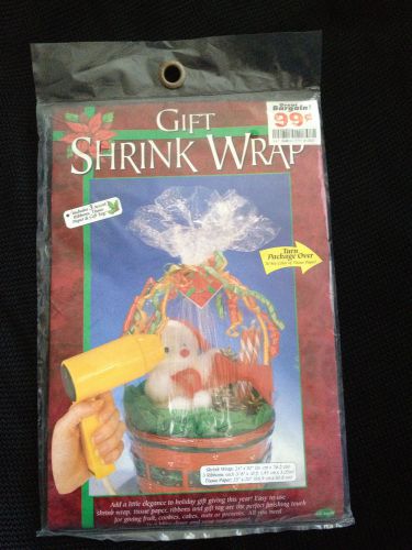 Holiday gift shrink wrap kit with ribbons and tissue paper for sale
