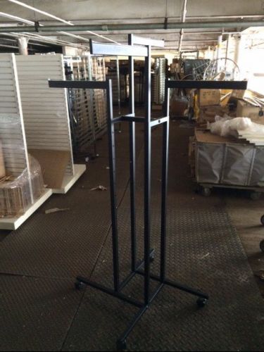 Rolling 4 way racks black used clothing store fixture wheels lot 10 standard arm for sale