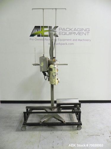 Used- Doboy Model D-95E Sewing Head Bag Stitcher capable of speeds up to 50 bags